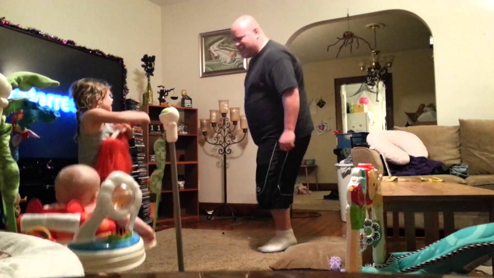 Husband caught on hidden camera playing with the kids