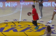 Fan hits half court basketball shot