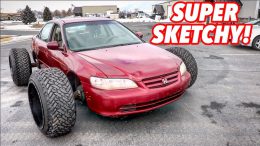 Giant Truck Wheels on a Small Car